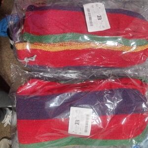 Two identical colorful hammocks brand new in packages still